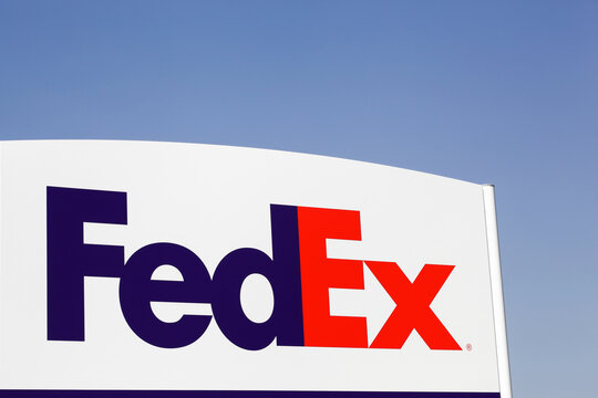 Kolding, Denmark - August 16, 2020: FedEx sign on a panel. FedEx Corporation is an American global courier delivery services company headquartered in Memphis, Tennessee
