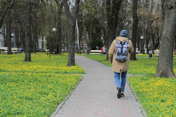 Fototapeta premium person walking in the park