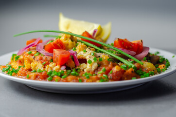 Haricot tomato bean sauce with turmeric potatoes, pork and herb sausage, and scrambled egg