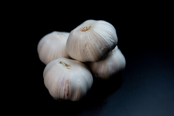 Garlic isolated on the black background