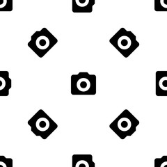Seamless pattern of repeated black photo camera symbols. Elements are evenly spaced and some are rotated. Vector illustration on white background