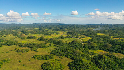 Scenic view on amazingly shaped Chocolate hills in Bohol island, Philippines.
