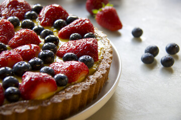 soft focus on fruits cake with berries