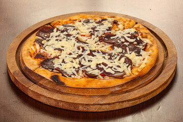 Pizza with dry beef and cheese