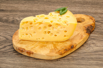 Maasdam cheese - yellow triangle with holes