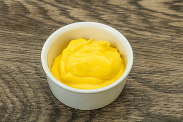 Natural cheese sauce in the bowl