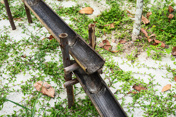 The bamboo gutter is a way to deliver water in the rural way