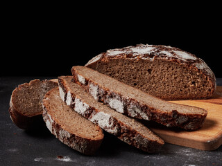 Homemade bread on a on rustic background copy space.