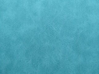blue suede with a clear texture as the background. High quality photo