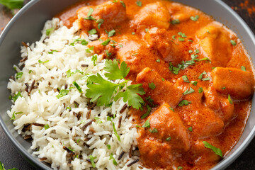 Chicken Paprikash with basmati, wild rice in juicy paprika sauce and parsley.