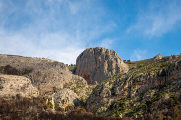 Fototapeta premium Natural landscape of the mountains in the interior of the province of Alicante (Spain), on a day with some clouds.