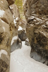 Slot canyon in winter covered with snow - 431379175