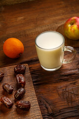 Iftar food for Ramadan fasting dates, fruits and ayran.
