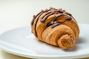 Croissants with strawberries and chocolate. High quality photo