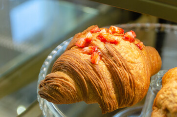Croissants with strawberries and chocolate. High quality photo