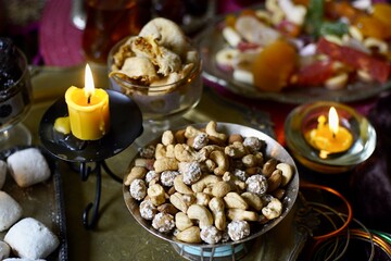 Plate with mix nuts on a eastern styled table