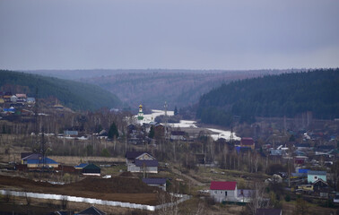 Fototapeta na wymiar Spring bad weather over the city of Kungur, Perm Territory