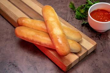 Breadsticks with dipping marinara sauce