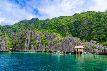 Twin Lagoon on paradise island with sharp limestone rocks, tropical travel destination - Coron, Palawan, Philippines.