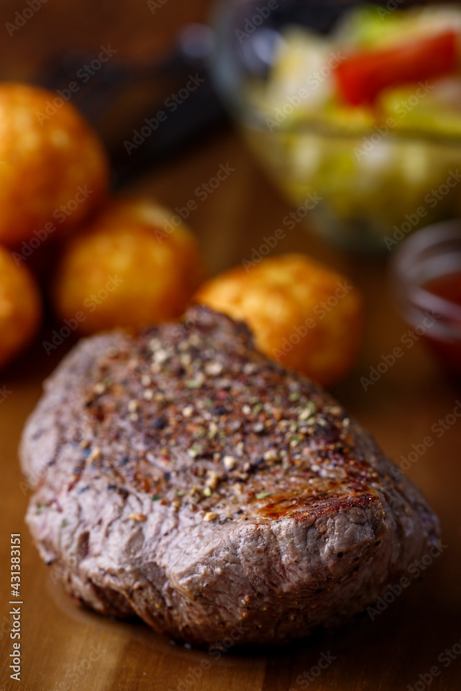 Wall mural grilled steak on a cutting board