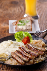 nuremberg sausages in a serving pan