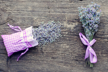 Bunch of lavender flowers and sachet filled with dried lavender