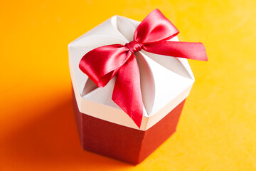 Gift box wrapped in kraft paper and bow