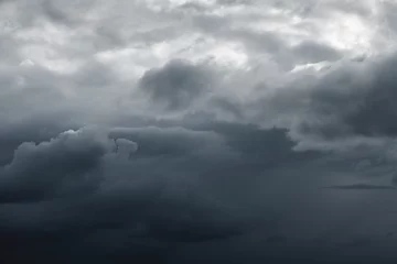Fotobehang pre-storm sky with a black cloud © Владимир Крышковец