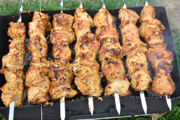 Cooking meat skewers