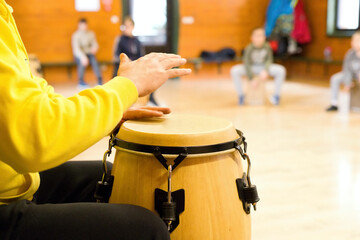 hands of the musician playing the drums