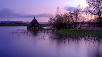 View at blue hour on the Cranog at Llangors Lake near Brecon in the Brecon Beacons, Wales, UK