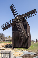 Wooden windmill in the village of Vytachiv (Vitachev) in Kiev region in Ukraine