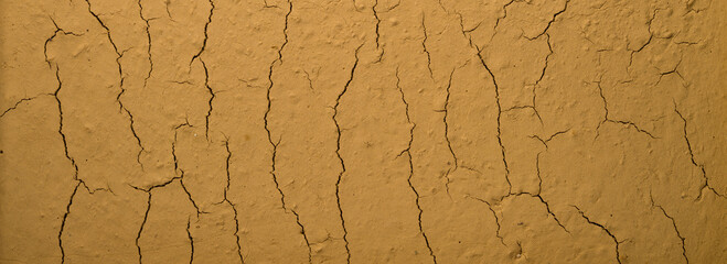 panoramic view of cracked yellow soil