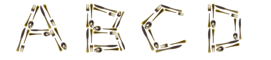 The letters A, B, C, D are made from tableware
