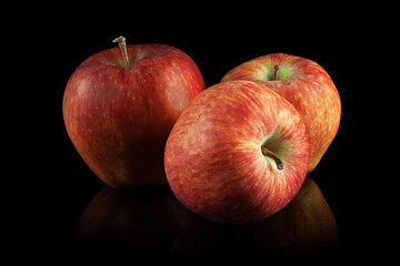apples on a black background
