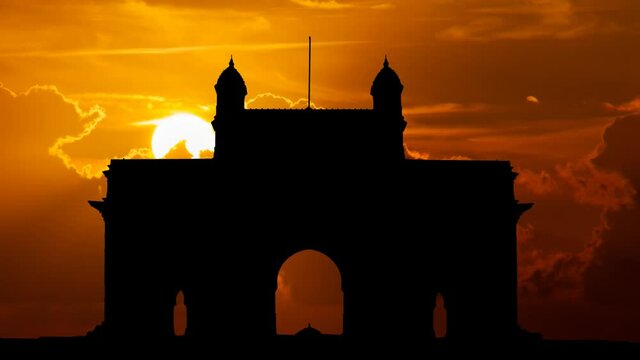 Gateway of India Skyline, Time Lapse at Sunset with Red Clouds and Fiery Sky, Mumbai, India