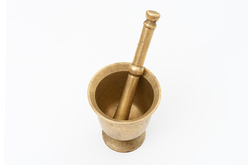 Antique and mged pestle and mortar on the white background.