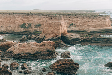 Rocky cliffs, bluffs, caves in Montana de Oro State Park, California Central Coast