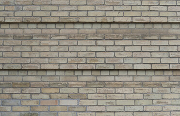 art-deco era, yellow brick wall background