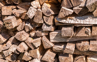 Cut and stacked aged wood logs to be used for heating in Warren County, Pennsylvania, USA