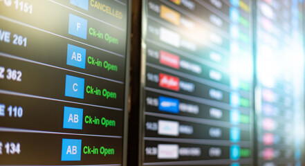 Airport flight information board or display and on time status. Different cities and destinations from all over the world.
