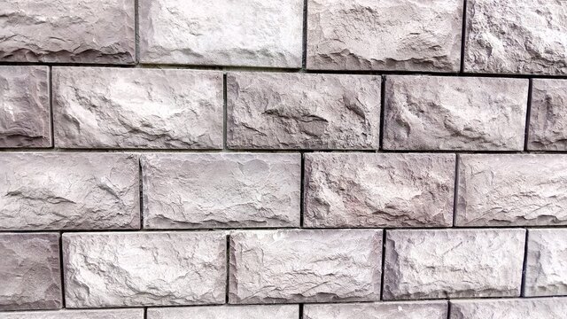 Fototapeta Gray brick wall. New and beautiful