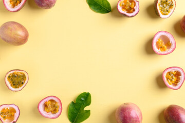 Fresh passion fruit on yellow background, Flat lay, Top view