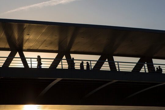 People on the bridge during Sunset Time in Bilbao