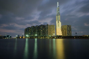Fototapeta premium Photo done by the author in Ho Chi Minh City, Vietnam. Time: evening on May 02, 2021. Landscape photos: when the city lights up (Viet Nam)