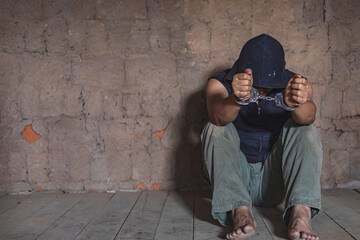 prisoner concept,Handcuffed hand of a prisoner in prison, Male prisoners were severely strained in the dark prison, violence,