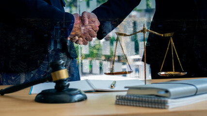 Lawyer Consulting Businessman in Office with Judge Hammer and Justice Scales with Laptop, Attorney Concept and Legal Consulting.