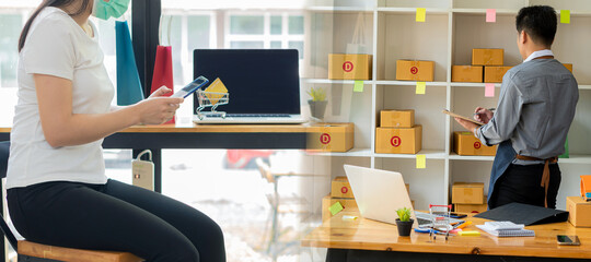 Startups, Entrepreneurs, Small Business, SME, Right Asian Men, Laptop and Mobile in Home Office, Warehouse, Shipping, Packaging, Online Marketing, SME E-Commerce Concept.