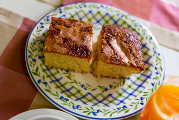 Country style breakfast. Slices of fluffy sponge cake with sugar crust served with fresh orange juice