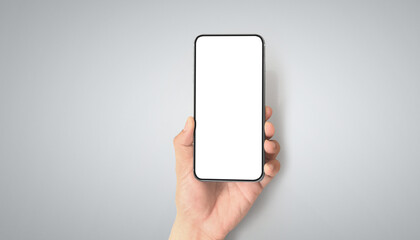 Hand holding smartphone device touching screen